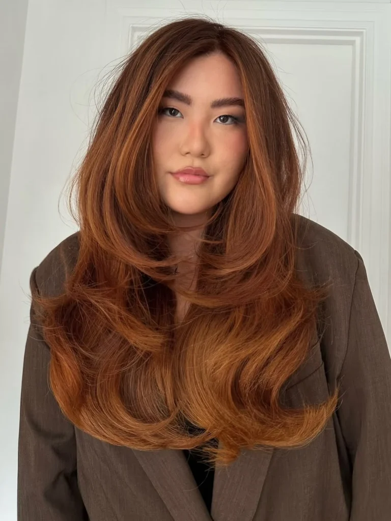 Copper red long layered hair