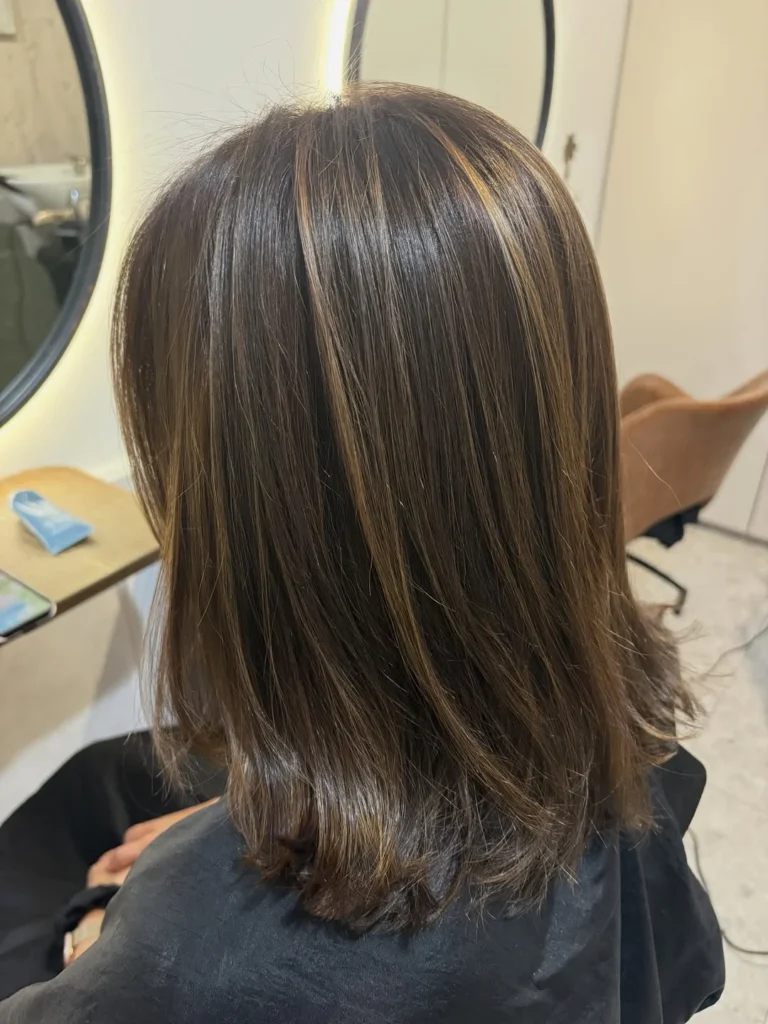 Brown hair with warm walnut highlights