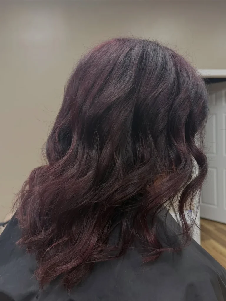 Deep burgundy copper wavy hair